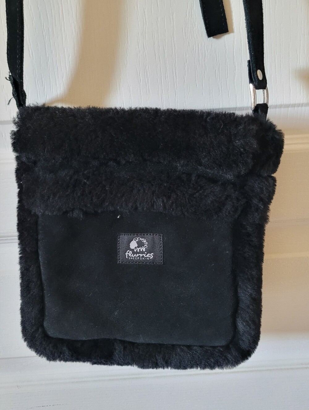 flurries sheep skin Black Cross Body Bag